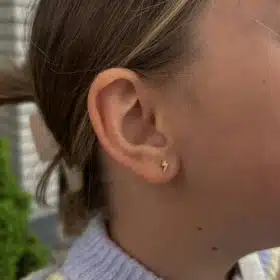 Cartilage piercing placed with a hollow needle at a Utah County piercing studio